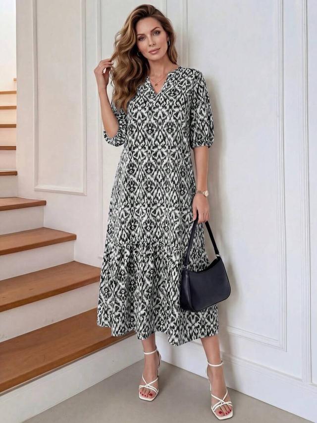 black and white printed notched neck puff sleeve dress