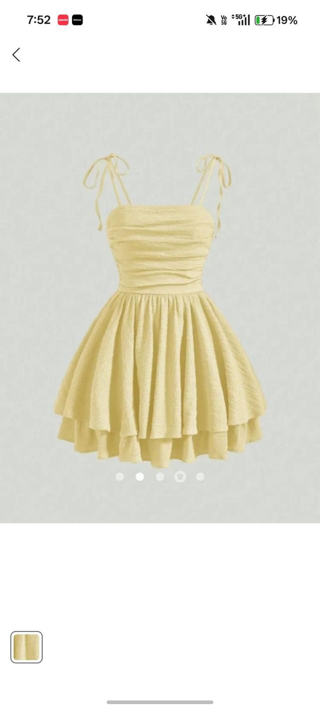pale yellow textured mini dress with tie straps