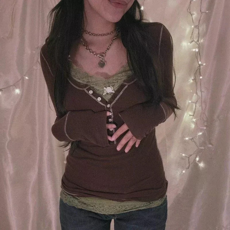 brown long sleeve top with exposed seam detailing