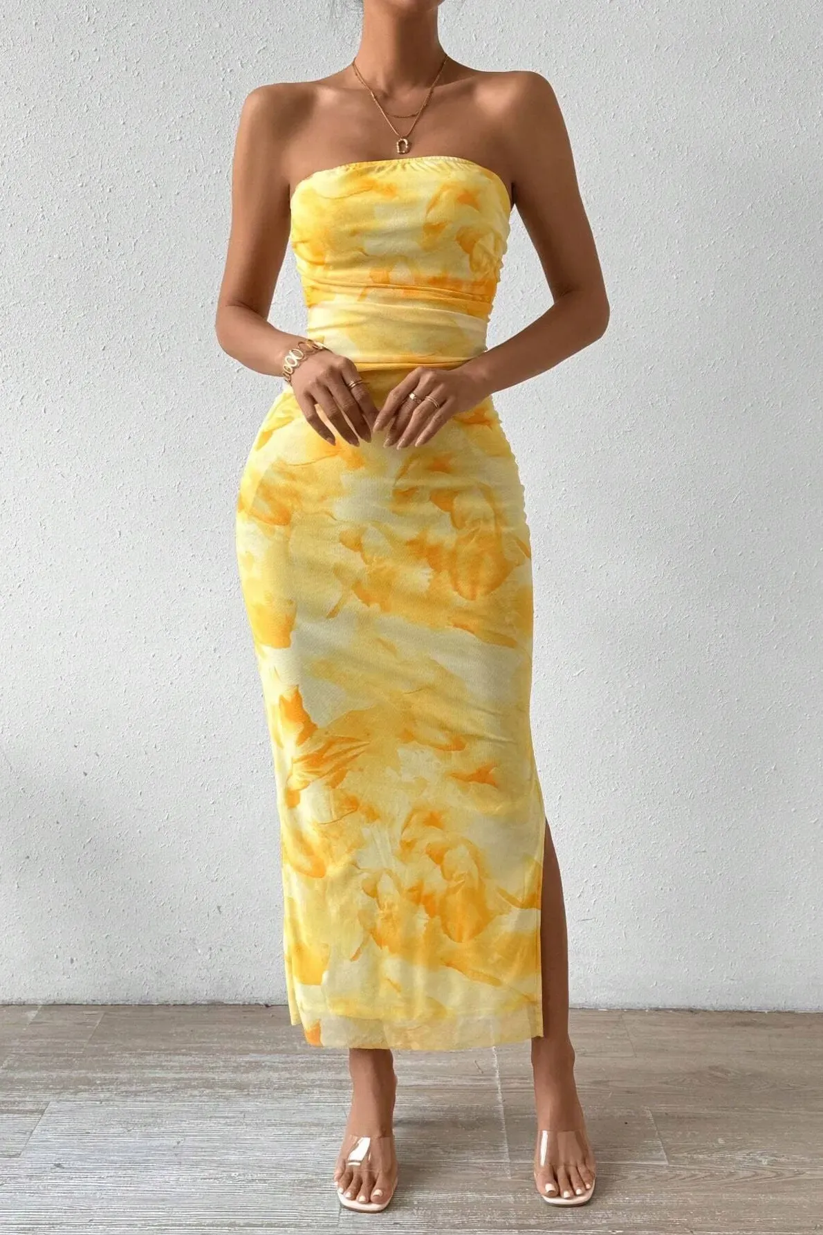 yellow abstract print strapless bodycon midi dress