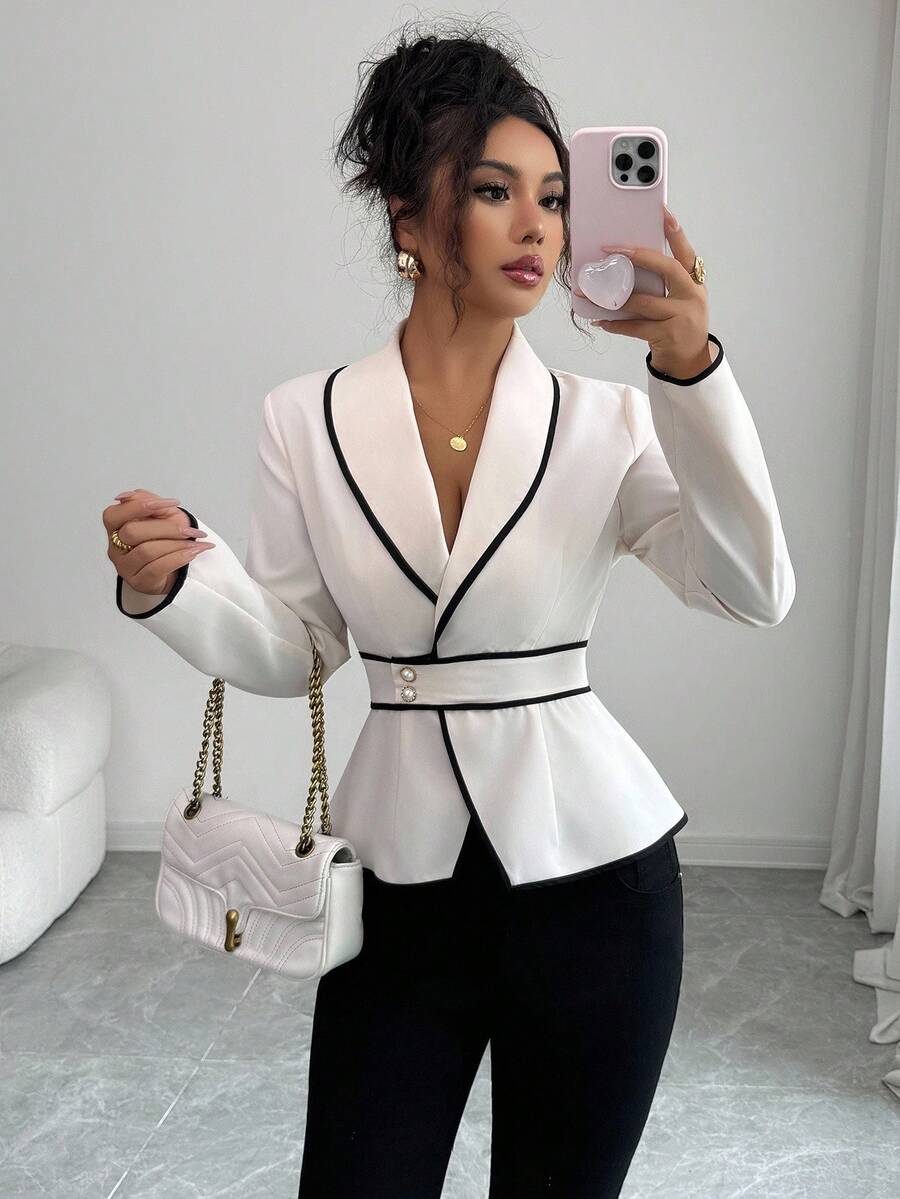 white cinched waist blazer with black piping