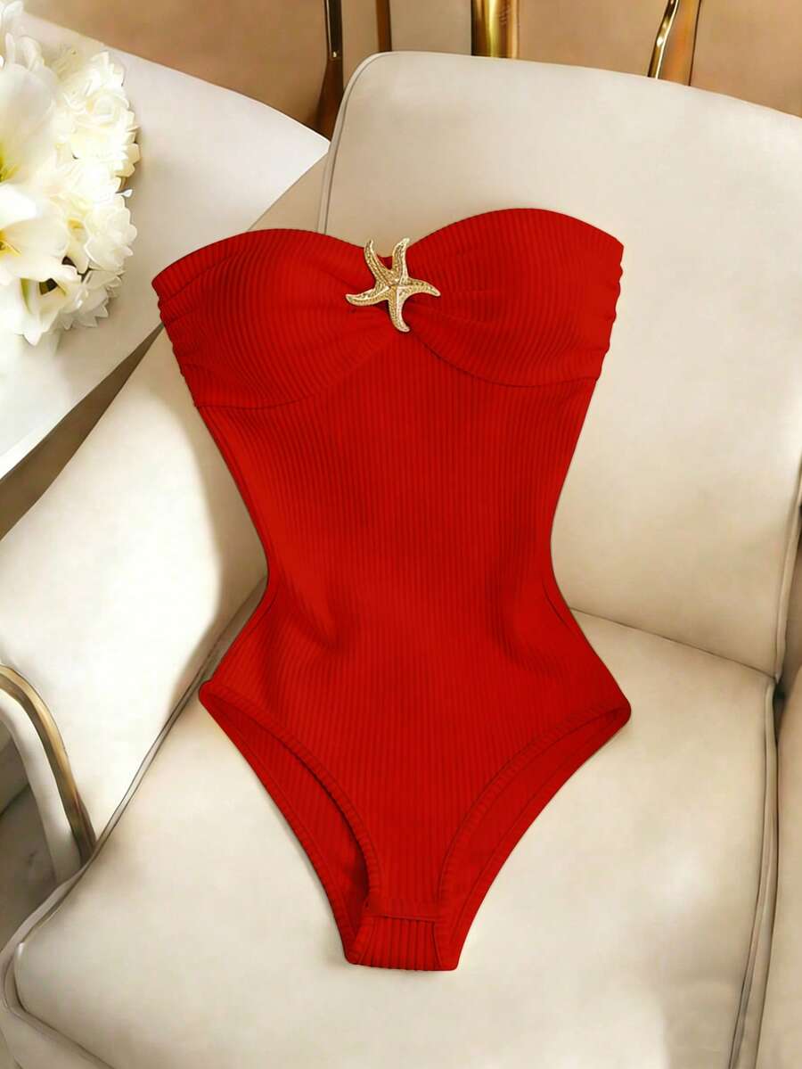 red strapless ribbed bodysuit with metal starfish detail