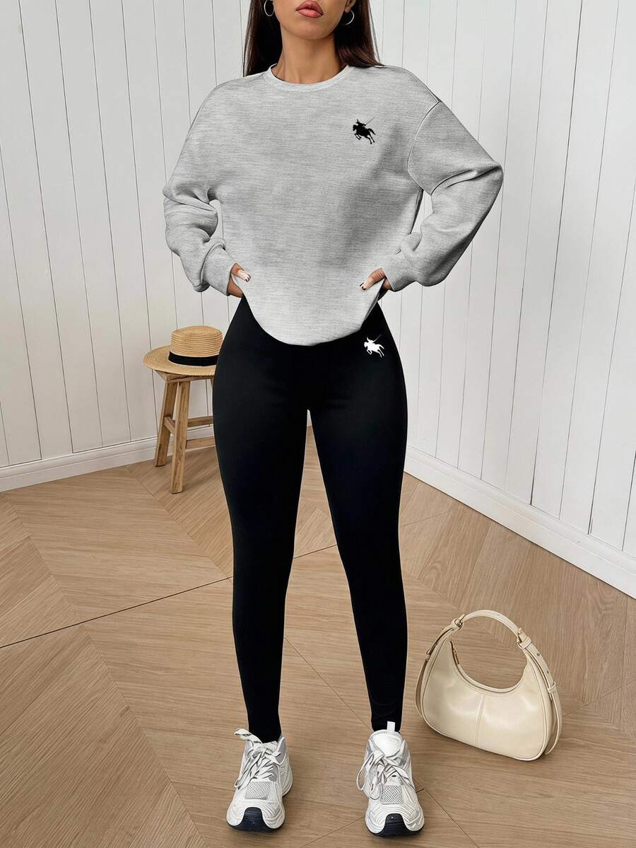grey crew neck sweatshirt and black leggings set