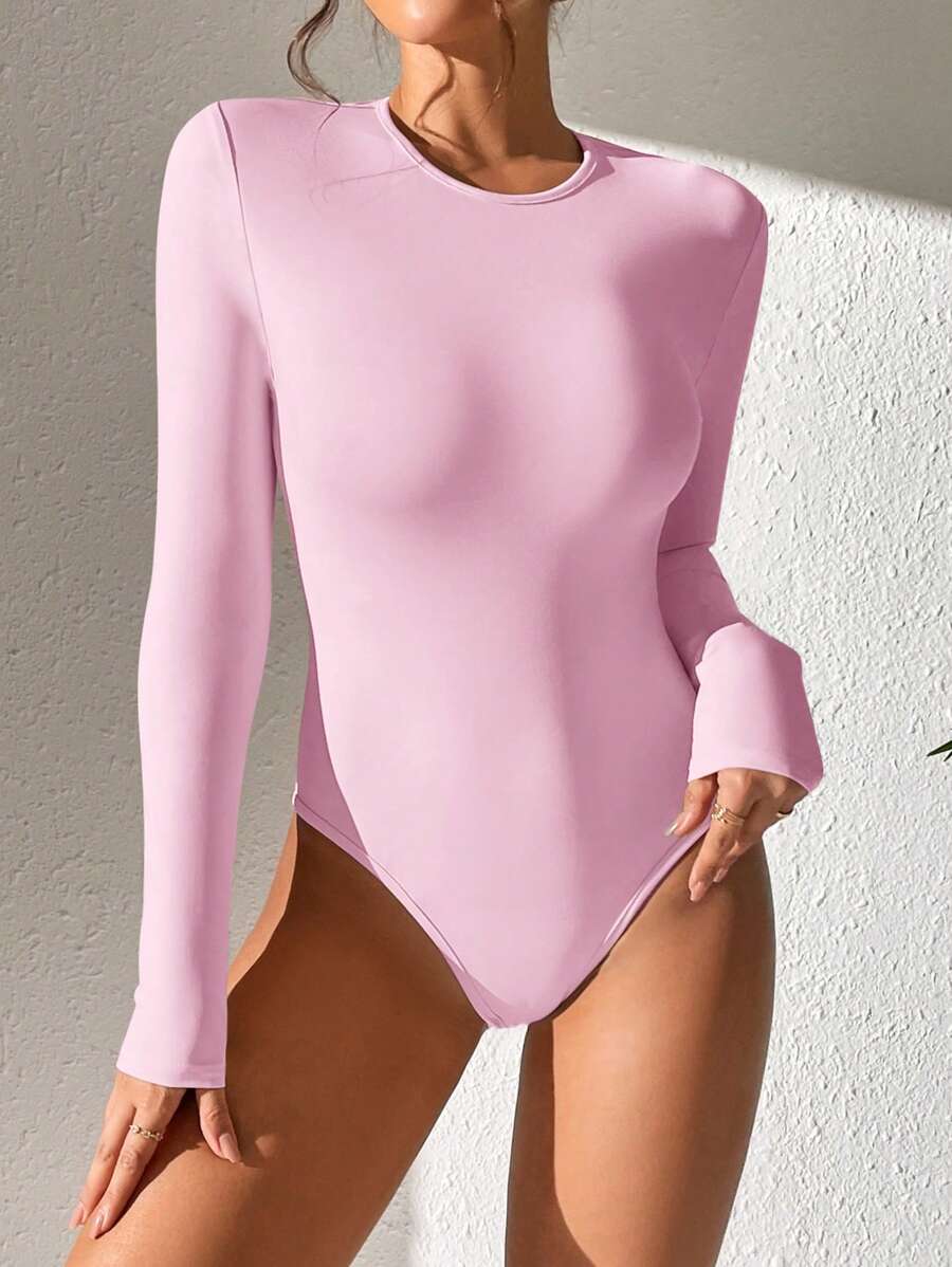 solid pink slim fit long sleeve bodysuit