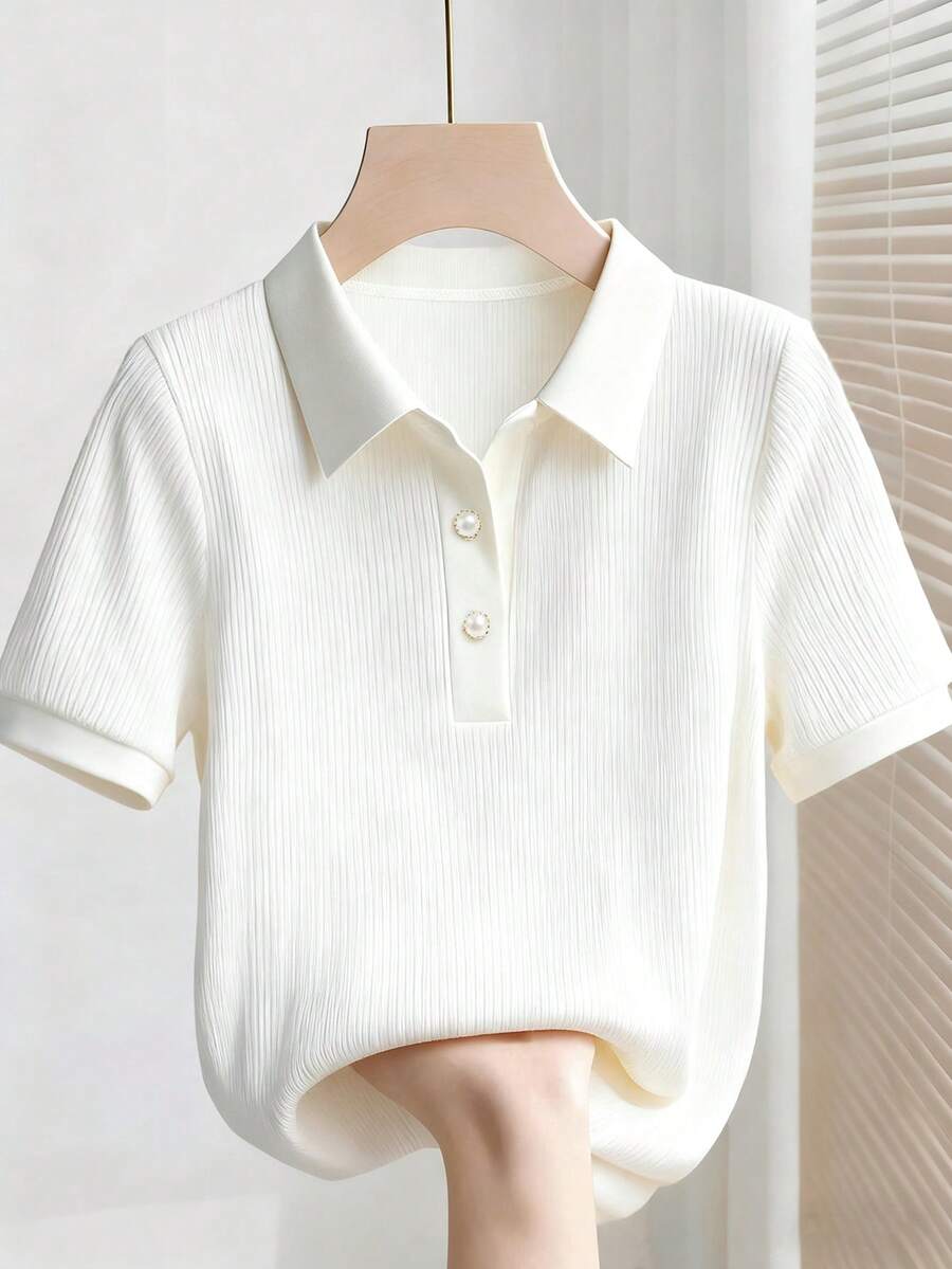 white ribbed collared short sleeve polo top