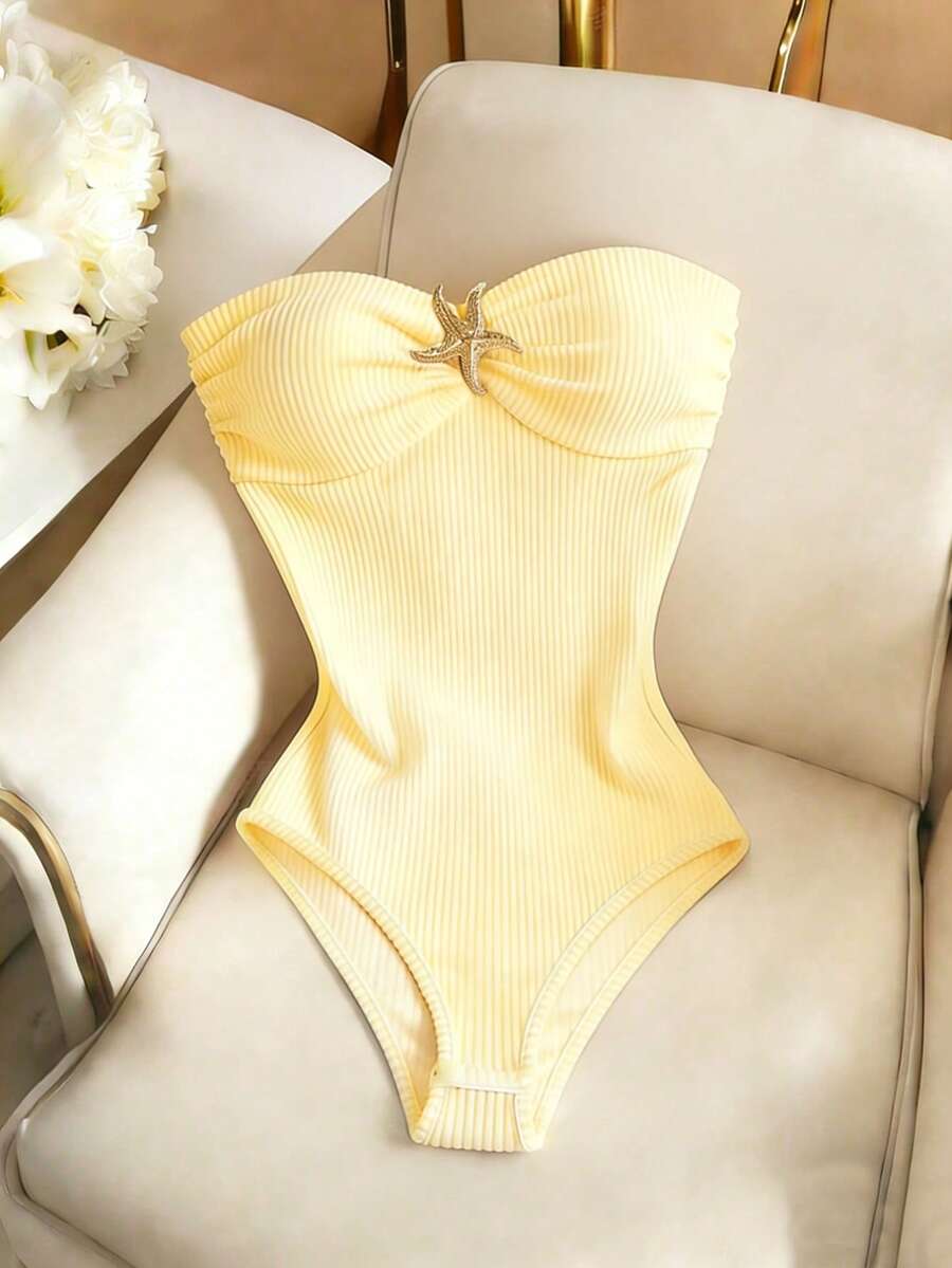 yellow ribbed strapless bodysuit with starfish buckle