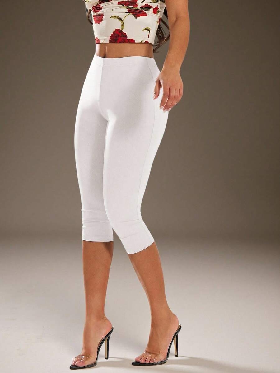 white high stretch form fitting capri leggings