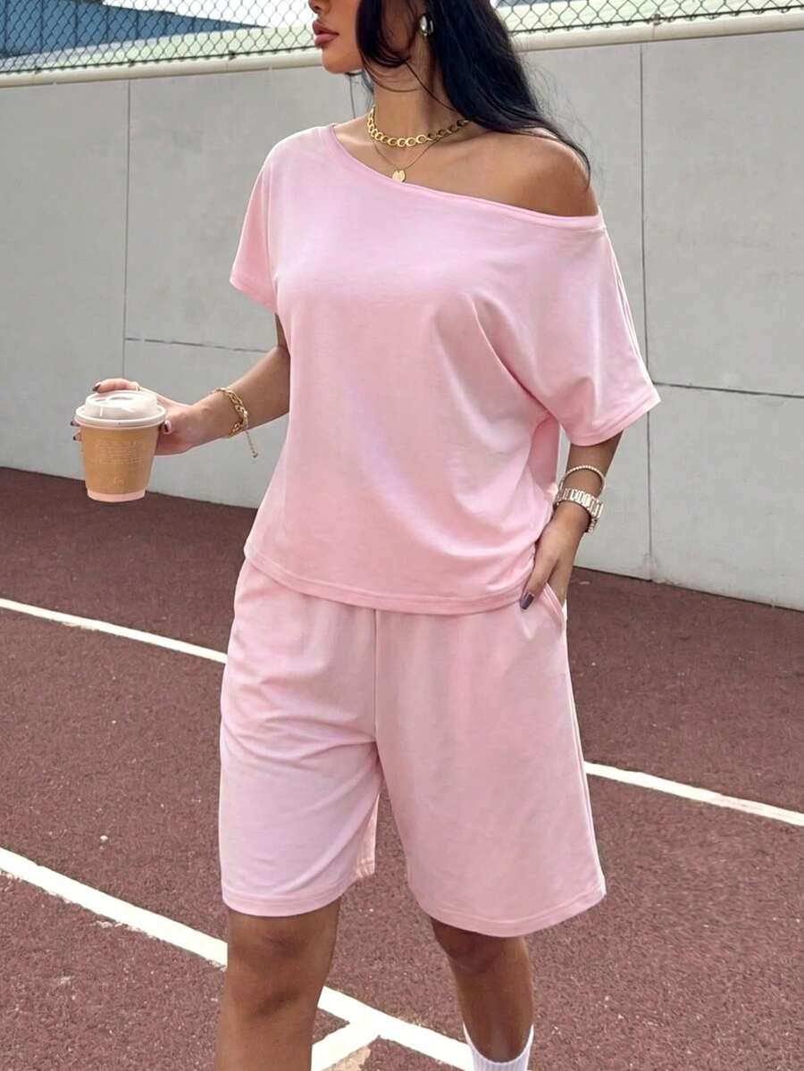 light pink knitted asymmetrical shoulder casual set