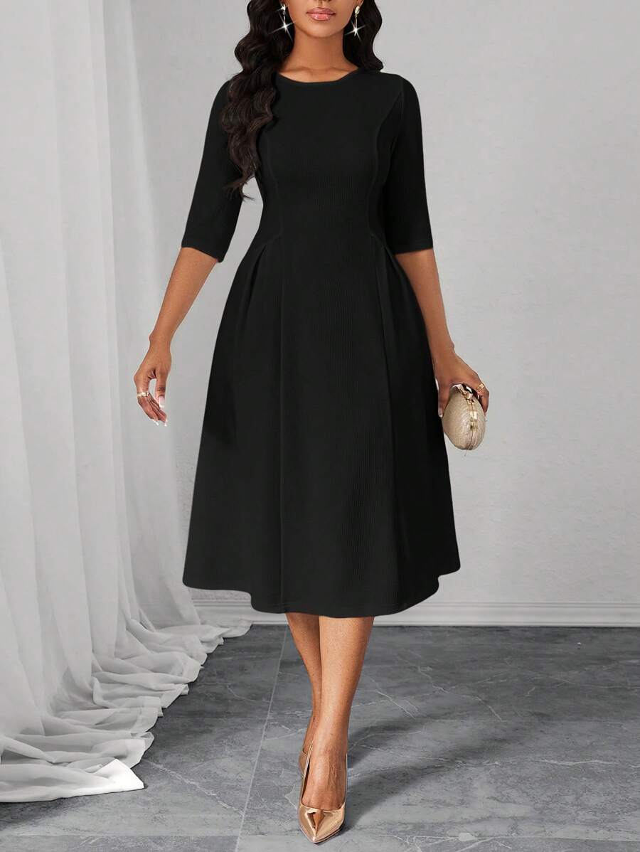 elegant black midi dress with princess seams