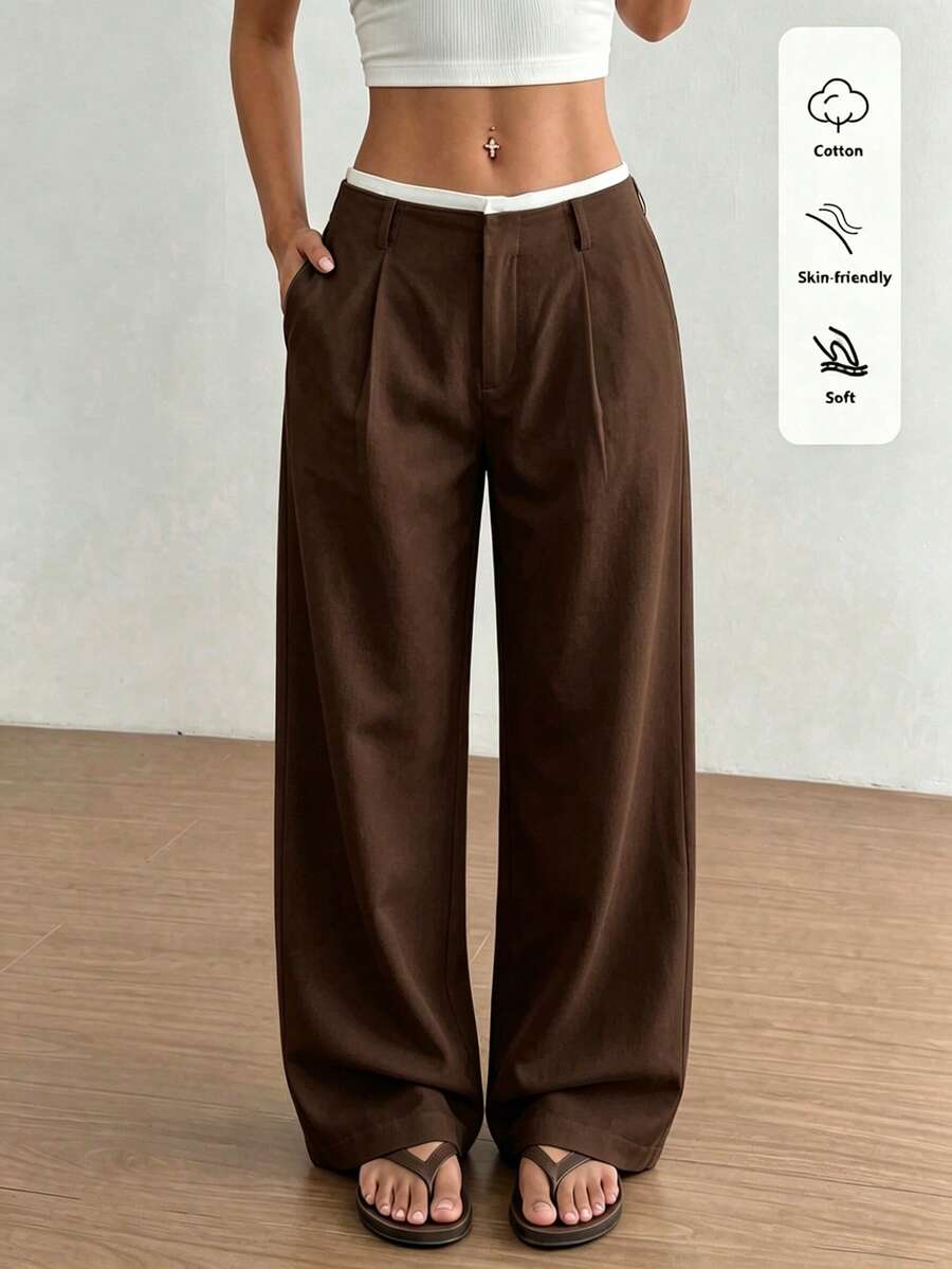brown high-waisted straight leg trousers with contrast waistband