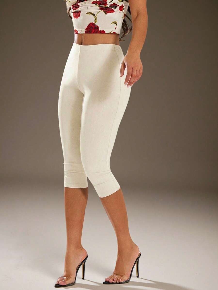 cream high stretch form fitting capri leggings