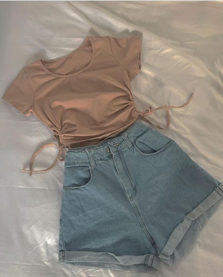 beige ruched side drawstring top with light wash denim jeans
